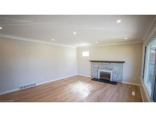 Main-352 Bunting Road, St. Catharines, ON - Indoor Photo Showing Living Room With Fireplace