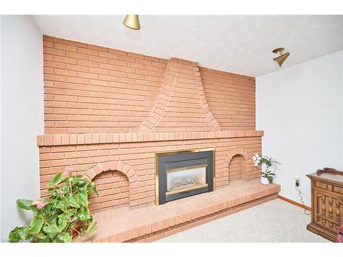 27 Quinn Avenue, Hamilton, ON - Indoor Photo Showing Living Room With Fireplace