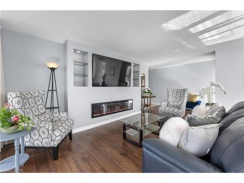 1008-3 Towering Heights Boulevard, St. Catharines, ON - Indoor Photo Showing Living Room With Fireplace