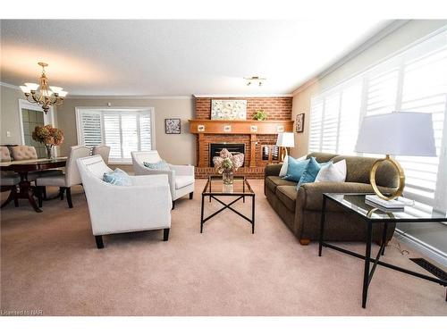 15 Burgess Drive, Grimsby, ON - Indoor Photo Showing Living Room With Fireplace