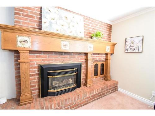 15 Burgess Drive, Grimsby, ON - Indoor Photo Showing Living Room With Fireplace