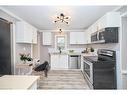 10 Mcghie Street, St. Catharines, ON  - Indoor Photo Showing Kitchen With Double Sink 