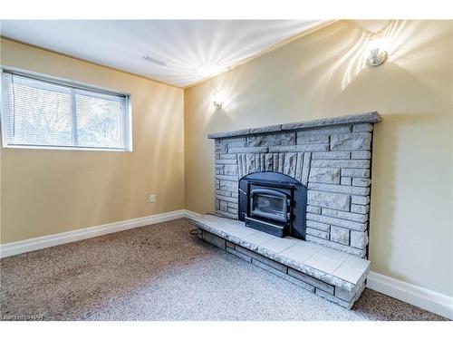 16 Royal Manor Drive, St. Catharines, ON - Indoor Photo Showing Living Room With Fireplace