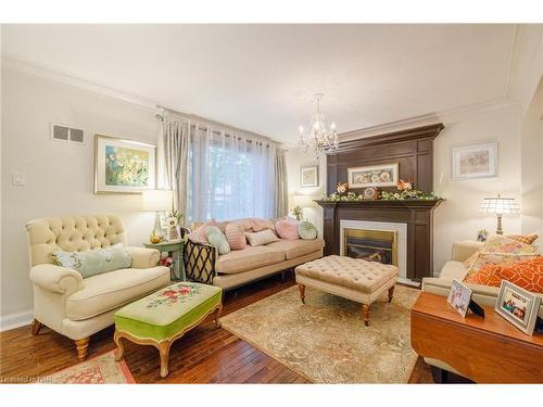 12 Cameron Road, St. Catharines, ON - Indoor Photo Showing Living Room With Fireplace