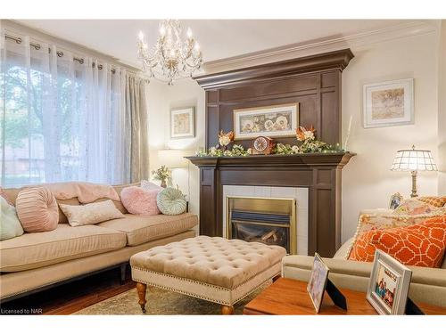 12 Cameron Road, St. Catharines, ON - Indoor Photo Showing Living Room With Fireplace