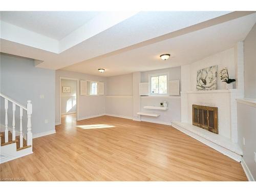 110 Strada Boulevard, St. Catharines, ON - Indoor Photo Showing Other Room With Fireplace