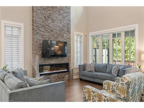 18-30 Power Glen, St. Catharines, ON - Indoor Photo Showing Living Room With Fireplace