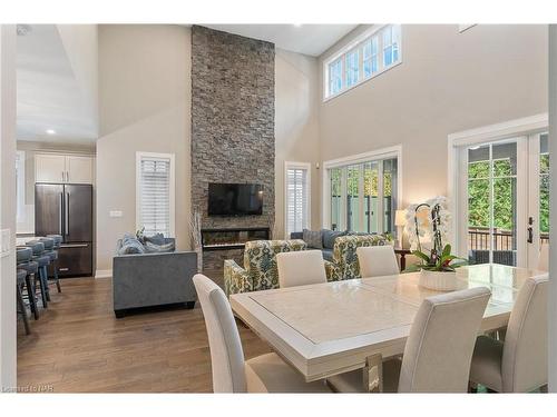 18-30 Power Glen, St. Catharines, ON - Indoor Photo Showing Dining Room With Fireplace