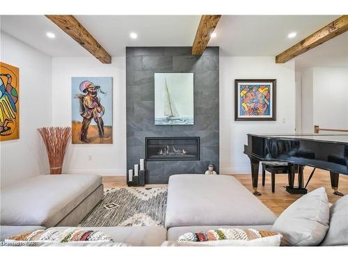 1007 Clare Avenue, Fonthill, ON - Indoor Photo Showing Living Room With Fireplace