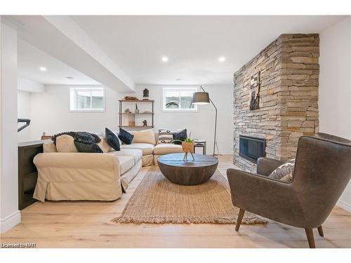 1007 Clare Avenue, Fonthill, ON - Indoor Photo Showing Living Room With Fireplace