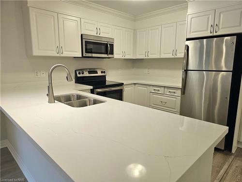 105-141 Vansickle Road, St. Catharines, ON - Indoor Photo Showing Kitchen With Stainless Steel Kitchen With Double Sink With Upgraded Kitchen