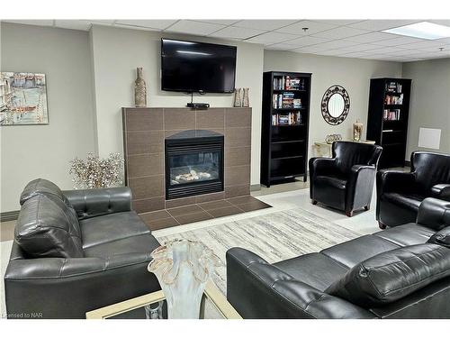 105-141 Vansickle Road, St. Catharines, ON - Indoor Photo Showing Living Room With Fireplace