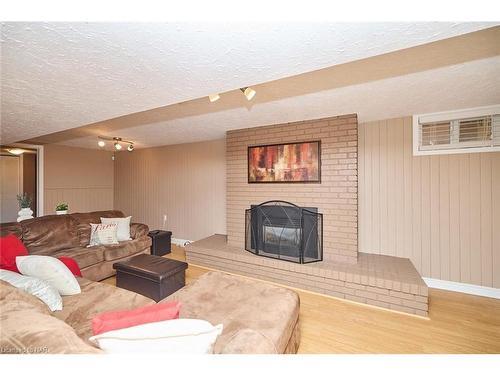 6931 Casey Street, Niagara Falls, ON - Indoor Photo Showing Living Room With Fireplace