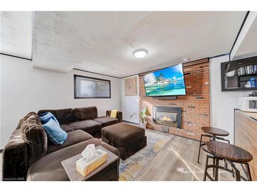 166 Bridlewood Drive, Welland, ON - Indoor Photo Showing Living Room With Fireplace