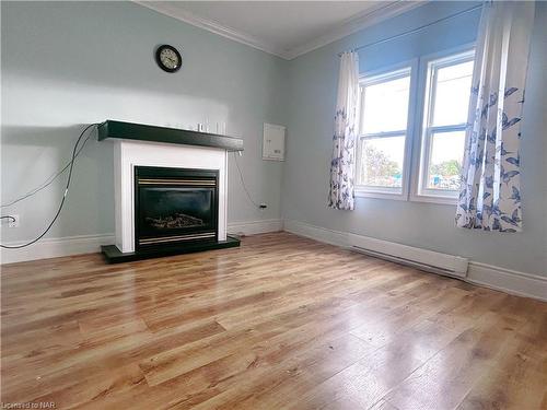 Front-70 Courtwright Street, Fort Erie, ON - Indoor Photo Showing Living Room With Fireplace