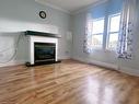 Front-70 Courtwright Street, Fort Erie, ON  - Indoor Photo Showing Living Room With Fireplace 