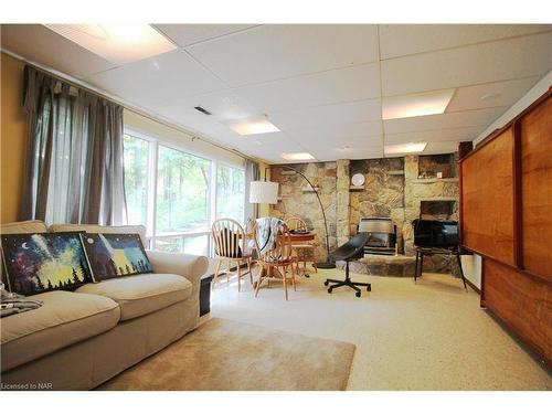 Lower-27 Glenbarr Road, St. Catharines, ON - Indoor With Fireplace