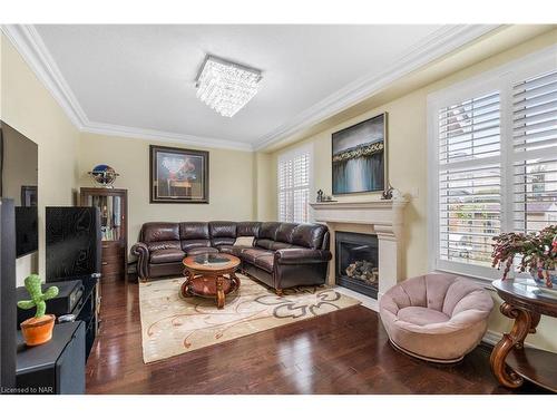 8892 Kudlac Street, Niagara Falls, ON - Indoor Photo Showing Living Room With Fireplace