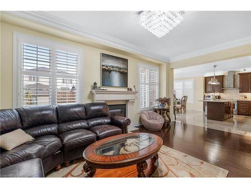 8892 Kudlac Street, Niagara Falls, ON - Indoor Photo Showing Living Room With Fireplace