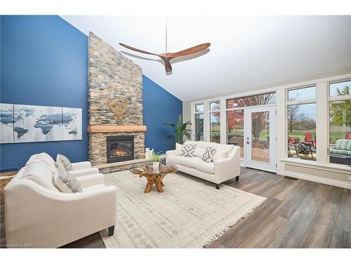 880 Metler Rd Road, Fenwick, ON - Indoor Photo Showing Living Room With Fireplace