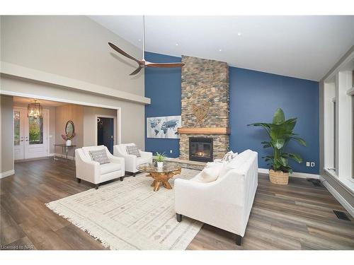 880 Metler Rd Road, Fenwick, ON - Indoor Photo Showing Living Room With Fireplace