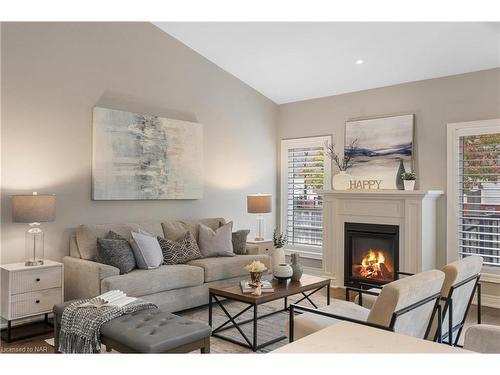 17-3340 Culp Road, Vineland Station, ON - Indoor Photo Showing Living Room With Fireplace