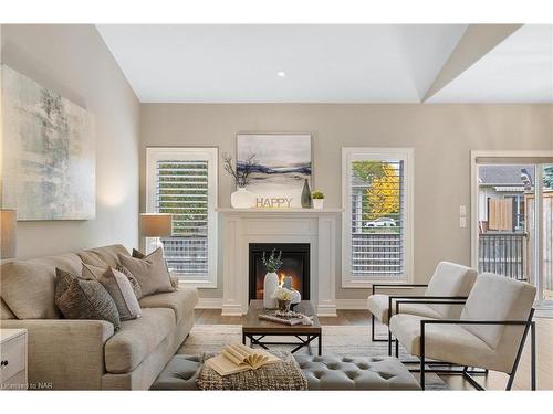 17-3340 Culp Road, Vineland Station, ON - Indoor Photo Showing Living Room With Fireplace