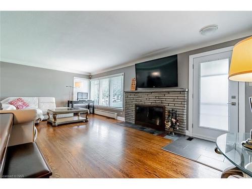 24 Munro Street, Thorold, ON - Indoor Photo Showing Living Room With Fireplace