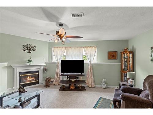 550 Albany Street, Fort Erie, ON - Indoor Photo Showing Living Room With Fireplace