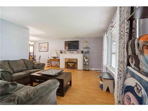 7988 Watson Street, Niagara Falls, ON - Indoor Photo Showing Living Room With Fireplace