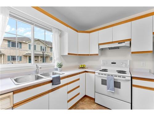 27-7470 Monastery Drive, Niagara Falls, ON - Indoor Photo Showing Kitchen With Double Sink