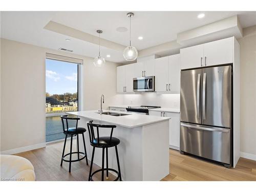 406-118 West Street, Port Colborne, ON - Indoor Photo Showing Kitchen With Double Sink With Upgraded Kitchen