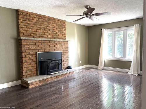 61 Barbican Trail, St. Catharines, ON - Indoor Photo Showing Living Room With Fireplace