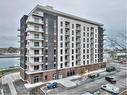 803-118 West Street, Port Colborne, ON  - Outdoor With Balcony With Facade 