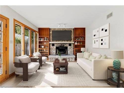 4981 Second Avenue, Niagara Falls, ON - Indoor Photo Showing Living Room With Fireplace