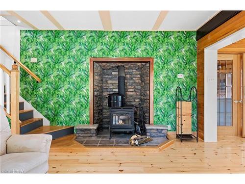 63023 Perry Road, Wainfleet, ON - Indoor Photo Showing Living Room With Fireplace