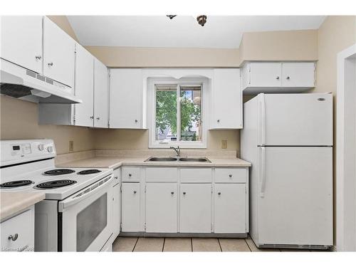 59 Wellington Street, St. Catharines, ON - Indoor Photo Showing Kitchen With Double Sink