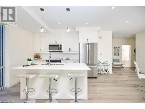 706-118 West Street, Port Colborne, ON - Indoor Photo Showing Kitchen With Stainless Steel Kitchen With Double Sink With Upgraded Kitchen