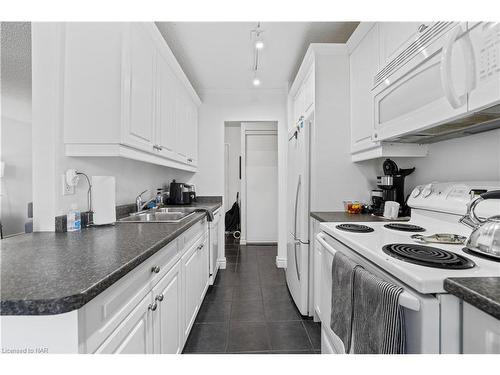 306-6390 Huggins Street, Niagara Falls, ON - Indoor Photo Showing Kitchen With Double Sink