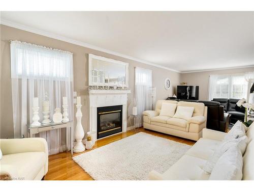 1 Shaver Road, St. Catharines, ON - Indoor Photo Showing Living Room With Fireplace