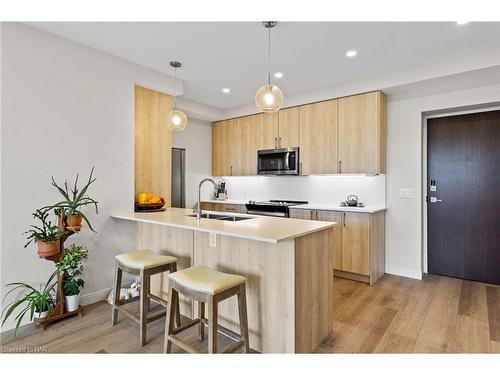 502-118 West Street, Port Colborne, ON - Indoor Photo Showing Kitchen With Double Sink With Upgraded Kitchen