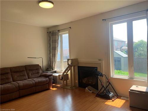 8817 Kudlac Street, Niagara Falls, ON - Indoor Photo Showing Living Room With Fireplace