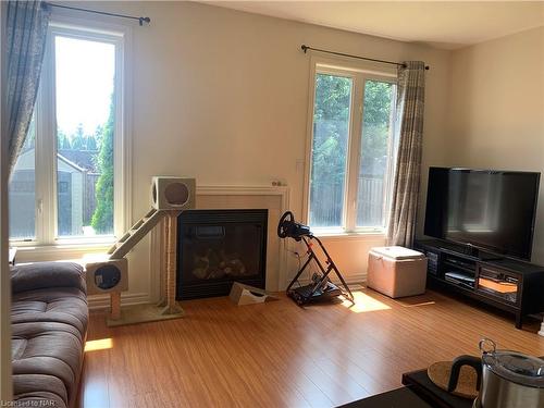 8817 Kudlac Street, Niagara Falls, ON - Indoor Photo Showing Living Room With Fireplace