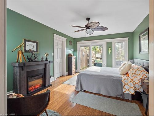 4330 Simcoe Street, Niagara Falls, ON - Indoor Photo Showing Bedroom With Fireplace