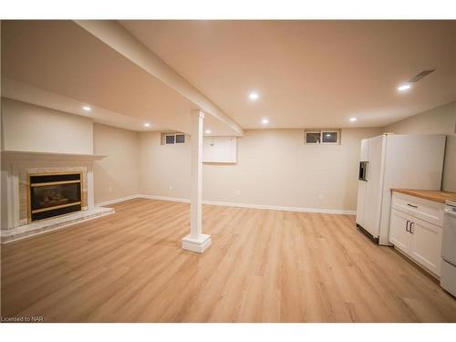 Lower-352 Bunting Road, St. Catharines, ON - Indoor Photo Showing Basement With Fireplace