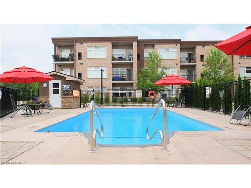 121-4644 Pettit Avenue, Niagara Falls, ON - Outdoor With In Ground Pool