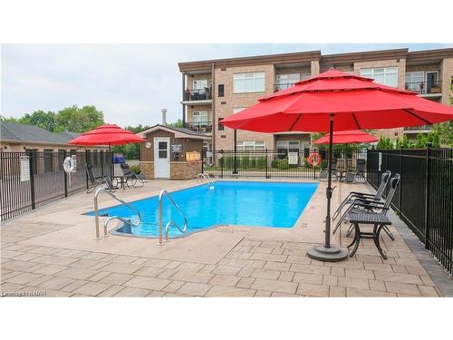 121-4644 Pettit Avenue, Niagara Falls, ON - Outdoor With In Ground Pool With Deck Patio Veranda