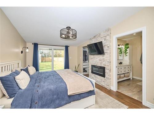 773 Clare Avenue, Welland, ON - Indoor Photo Showing Bedroom With Fireplace