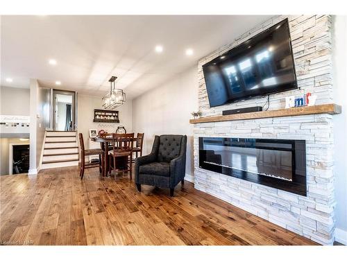 8 Dundee Drive, St. Catharines, ON - Indoor Photo Showing Living Room With Fireplace