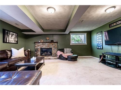 8 Dundee Drive, St. Catharines, ON - Indoor Photo Showing Living Room With Fireplace